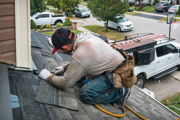 Professional Roofing technician working in Woodbourne, PA